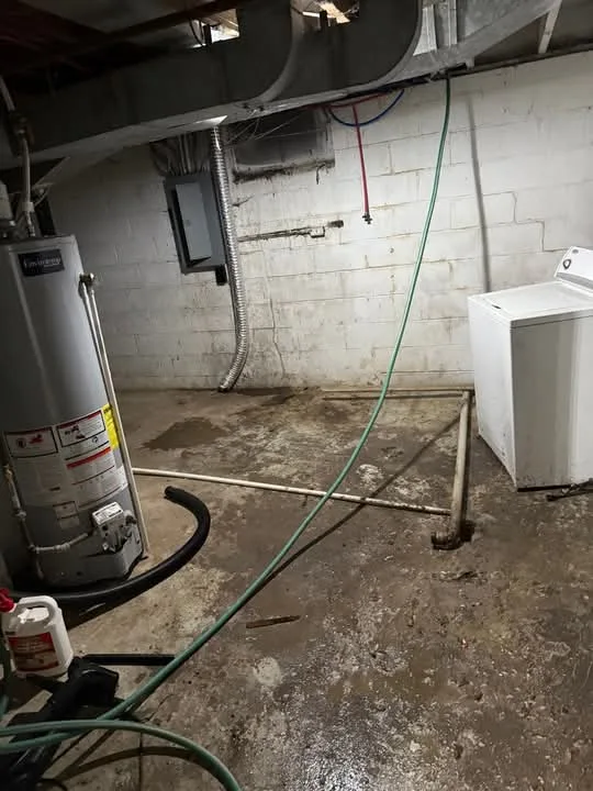 Basement subfloor and utility area during repair