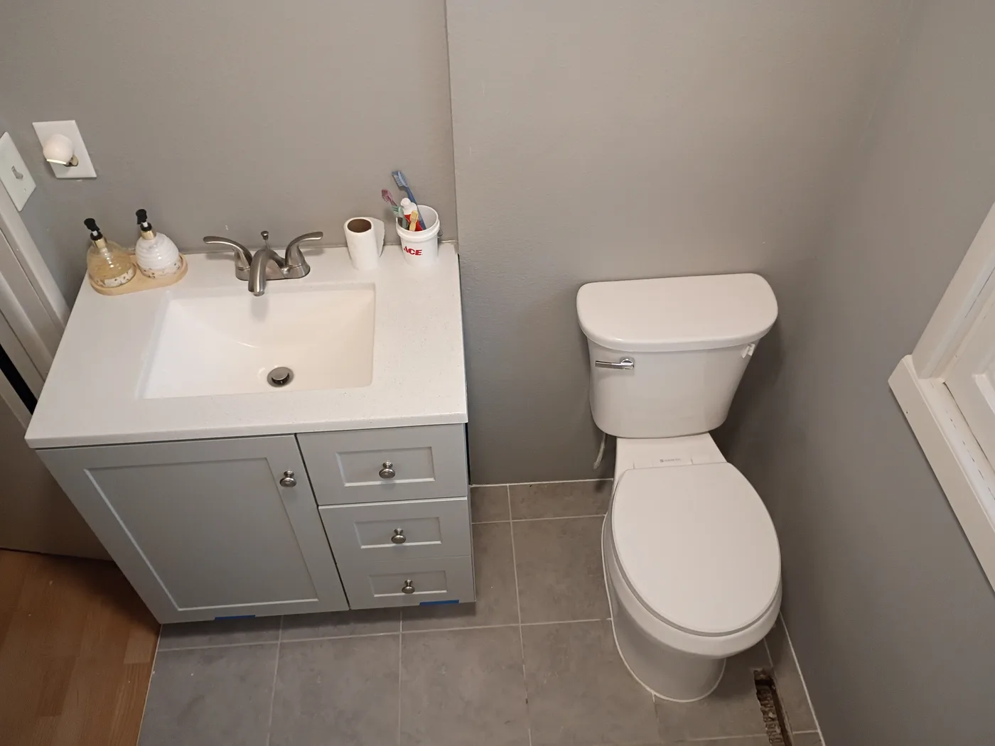 Finished bathroom with new vanity and toilet